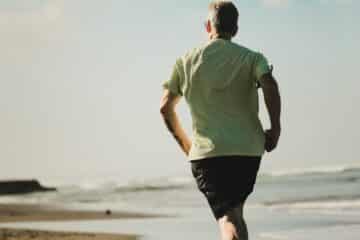 man running on seashore